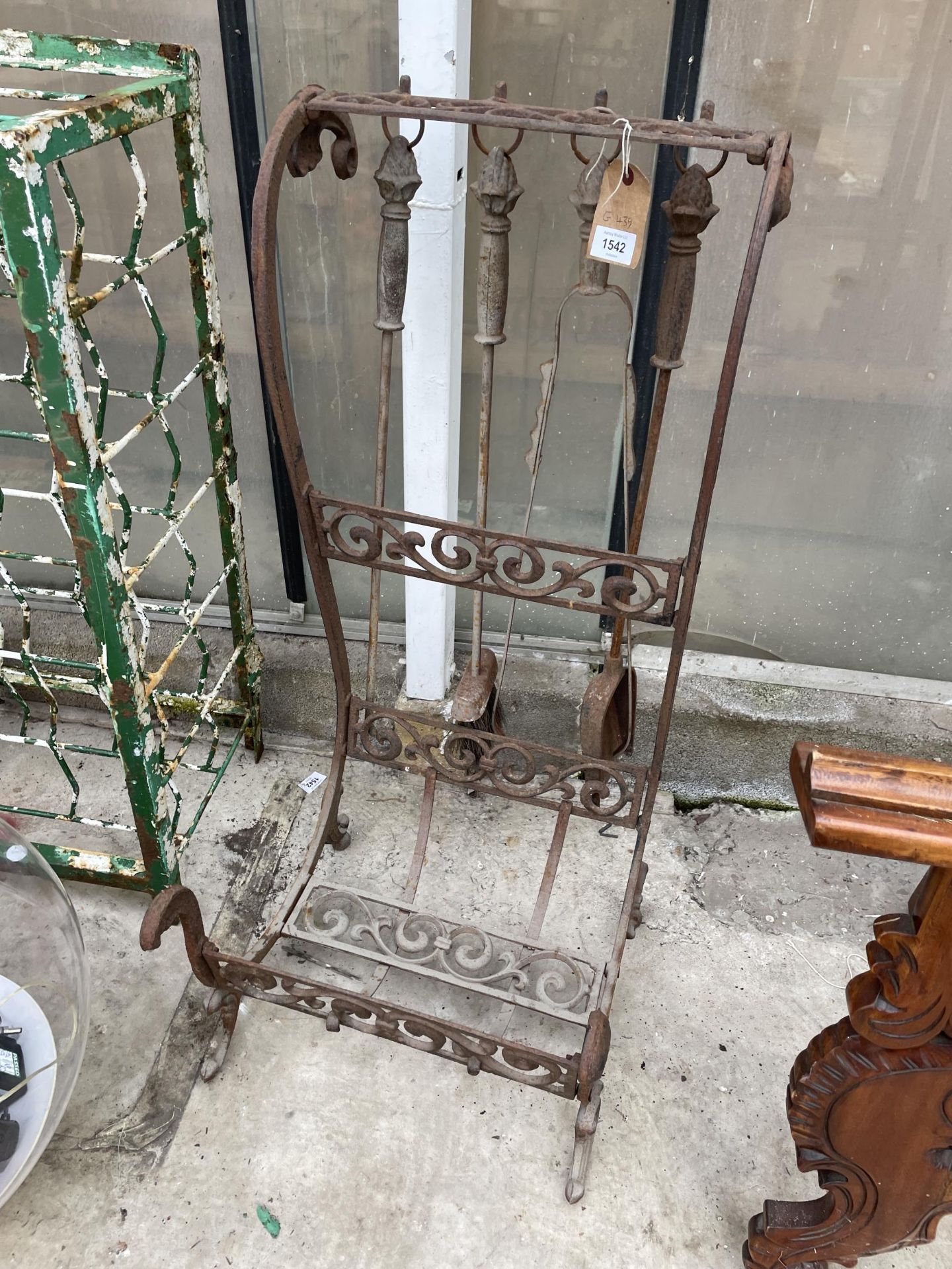 A VINTAGE STEEL COMPANION SET WITH LOG STAND