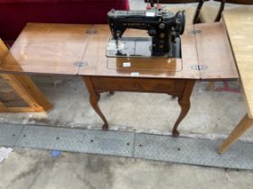 SINGER SEWING MACHINE (319K), TABLE ON CABRIOLE LEGS