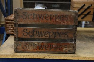 A VINTAGE SCHWEPPES WOODEN BOTTLE CRATE