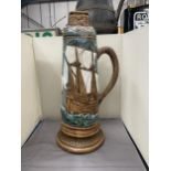 A LARGE ART AND CRAFTS GALLEON LIDDED JUG
