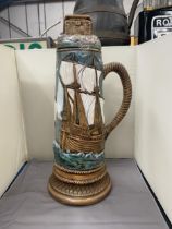 A LARGE ART AND CRAFTS GALLEON LIDDED JUG