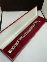 A HEAVY SILVER BRACELET IN A PRESENTATION BOX