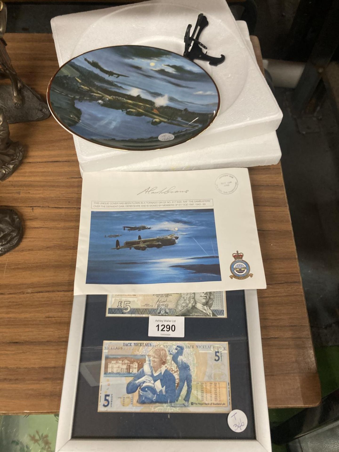 A FRAMED NICK FALDO FIVE POUND NOTE AND A LIMITED EDITION DAM BUSTERS PLATE WITH COA