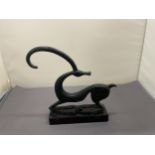 A BRONZE SCULPTURE OF A GRACEFUL IBEX ON A MARBLE BASE, HEIGHT 15CM, WIDTH 12CM