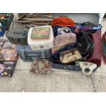 A LARGE ASSORTMENT OF BAGS AND SUITCASES ETC