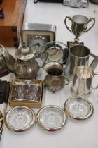 A QUANTITY OF SILVER PLATED ITEMS TO INCLUDE A TEAPOT, TANKARDS, A TROPHY, HIP FLASK, CLOCKS, ETC