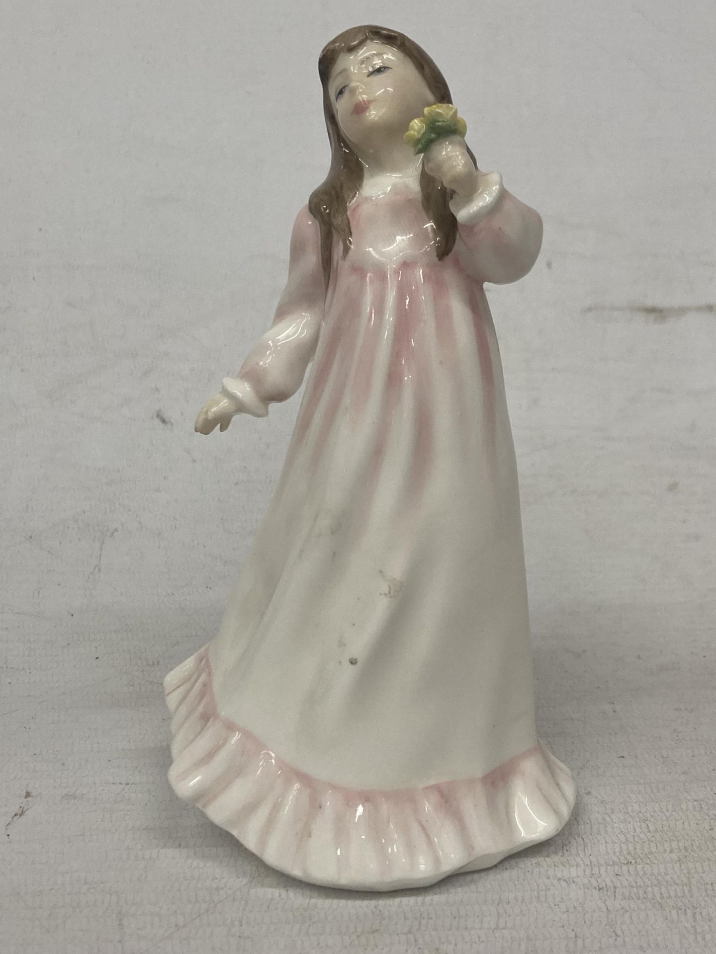 A ROYAL DOULTON FIGURINE "FLOWERS FOR MOTHER" HN3464"