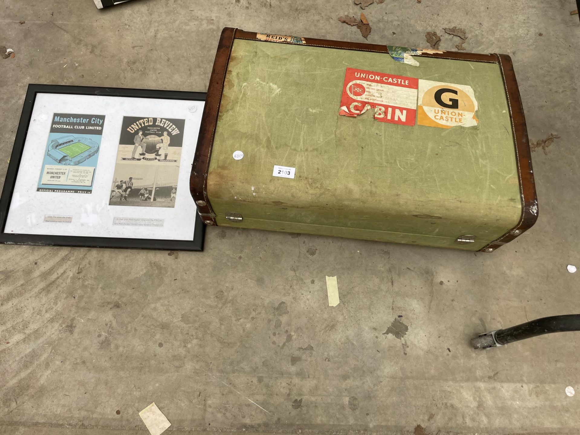 A VINTAGE TRAVEL CASE AND A FRAMED FOOTBALL PROGRAMME COVERS