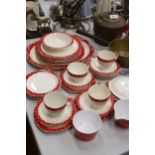 A STYLECRAFT, 'MIDWINTER', STAFFORDSHIRE RED AND WHITE TEASET TO INCLUDE PLATES, CUPS AND SAUCERS