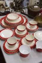 A STYLECRAFT, 'MIDWINTER', STAFFORDSHIRE RED AND WHITE TEASET TO INCLUDE PLATES, CUPS AND SAUCERS