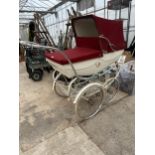 A VINTAGE SILVER CROSS PRAM