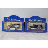 SIX BOXED VEHICLES TO INCLUDE AN RNLI LIFEBOAT, ERTL COLLECTIBLES, DIECAST TAXI'S ETC.,