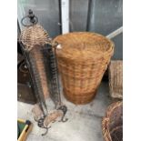 A LARGE WICKER BASKET AND A CD RACK