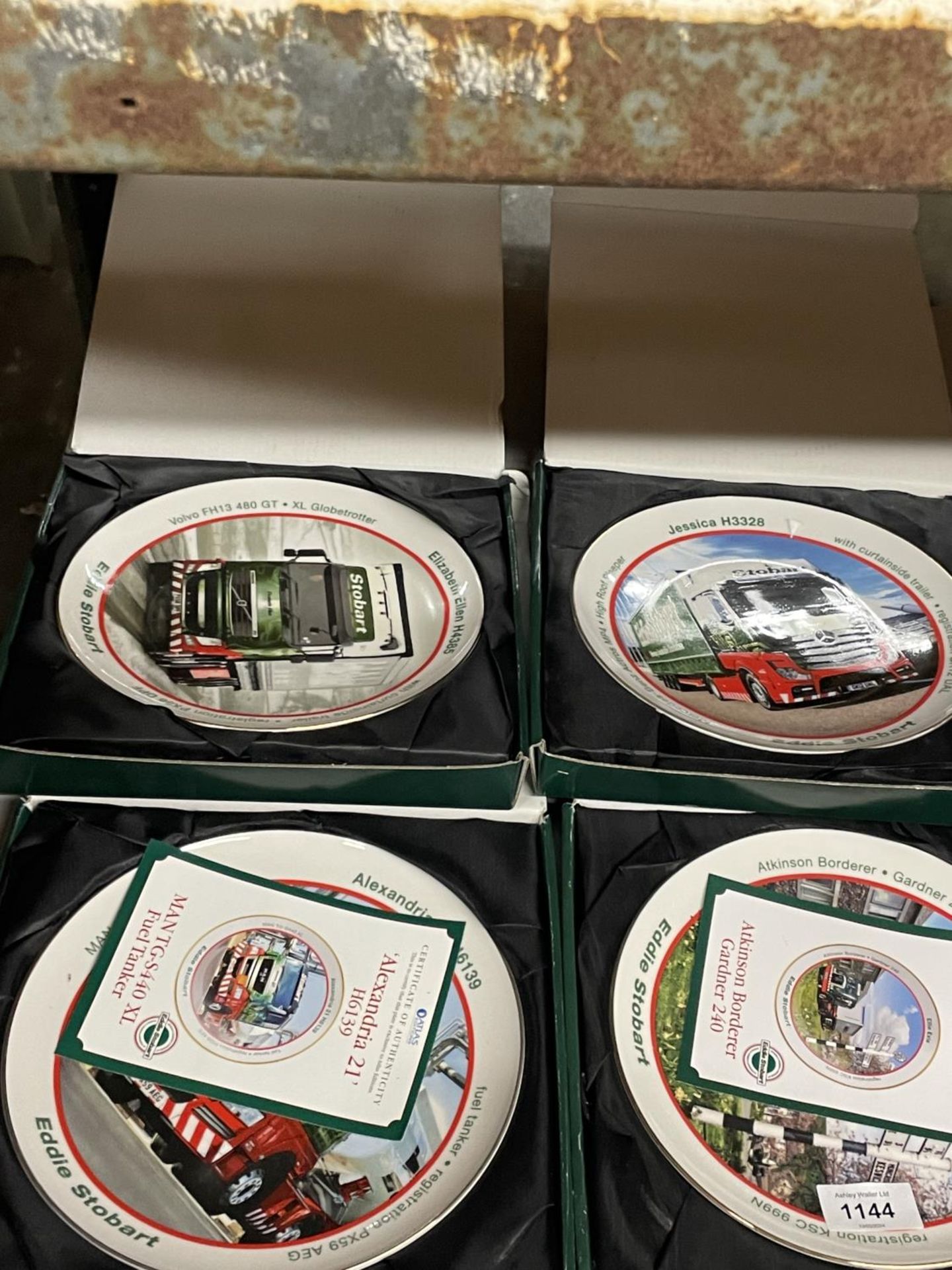 FOUR EDDIE STOBART BY ATLAS, CABINET PLATES IN ORIGINAL BOXES