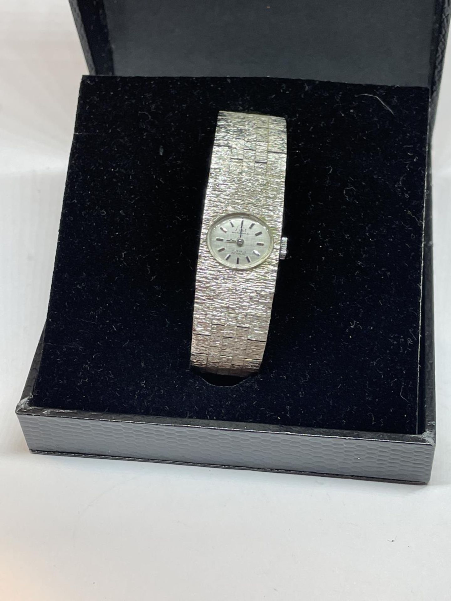 A LIMIT WRIST WATCH IN A PRESENTATION BOX SEEN WORKING BUT NO WARRANTY