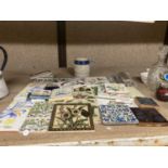 A COLLECTION OF VINTAGE TILES TO INCLUDE FLORAL DECORATED