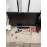 A BEKO 32" TELEVISION WITH REMOTE CONTROL