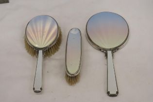 AN ENAMEL AND HALLMARKED LONDON SILVER TWO BRUSH AND MIRROR SET
