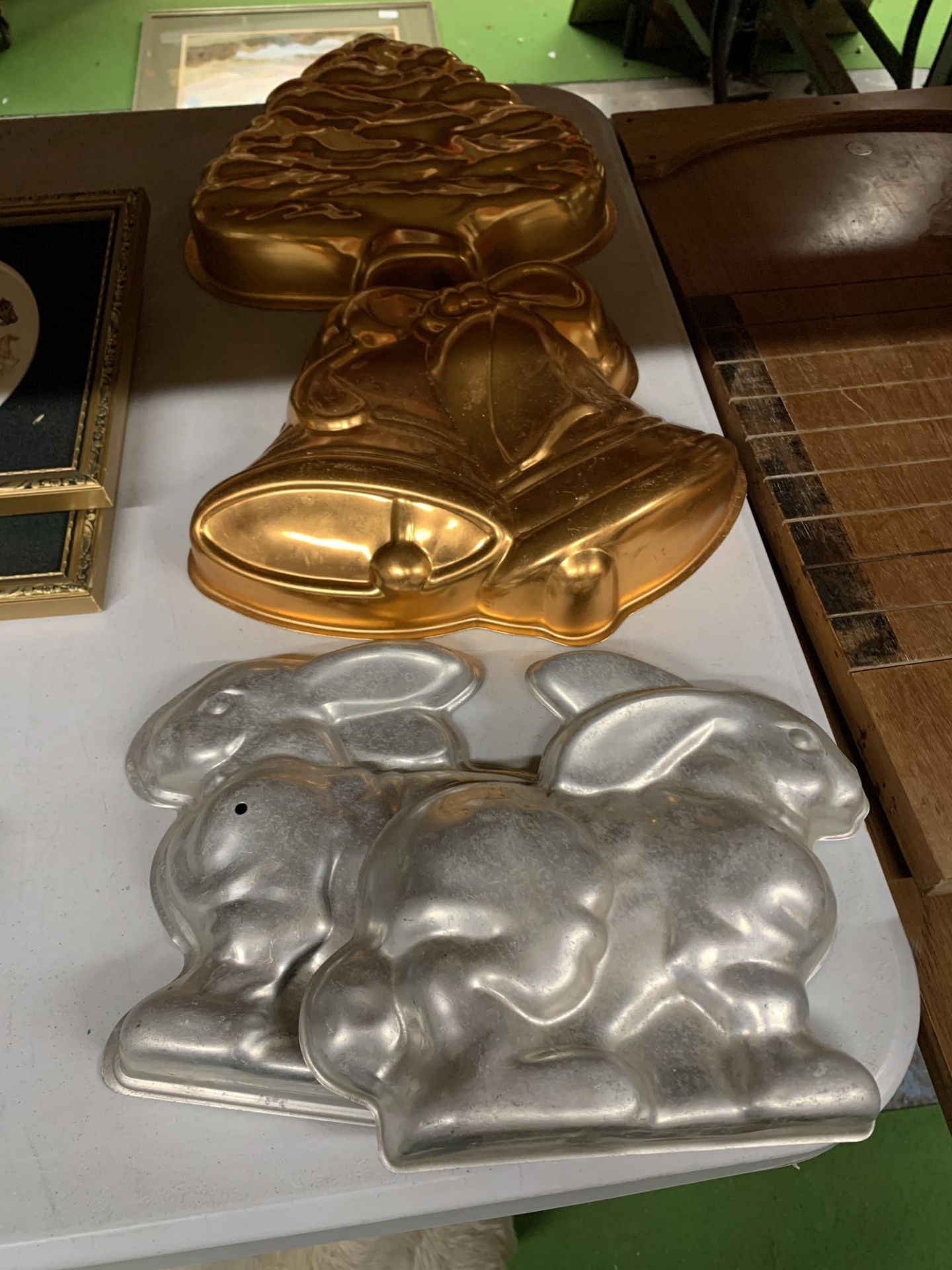 FOUR VINTAGE STYLE MOULDS, TWO TIN RABBITS AND TWO COPPER
