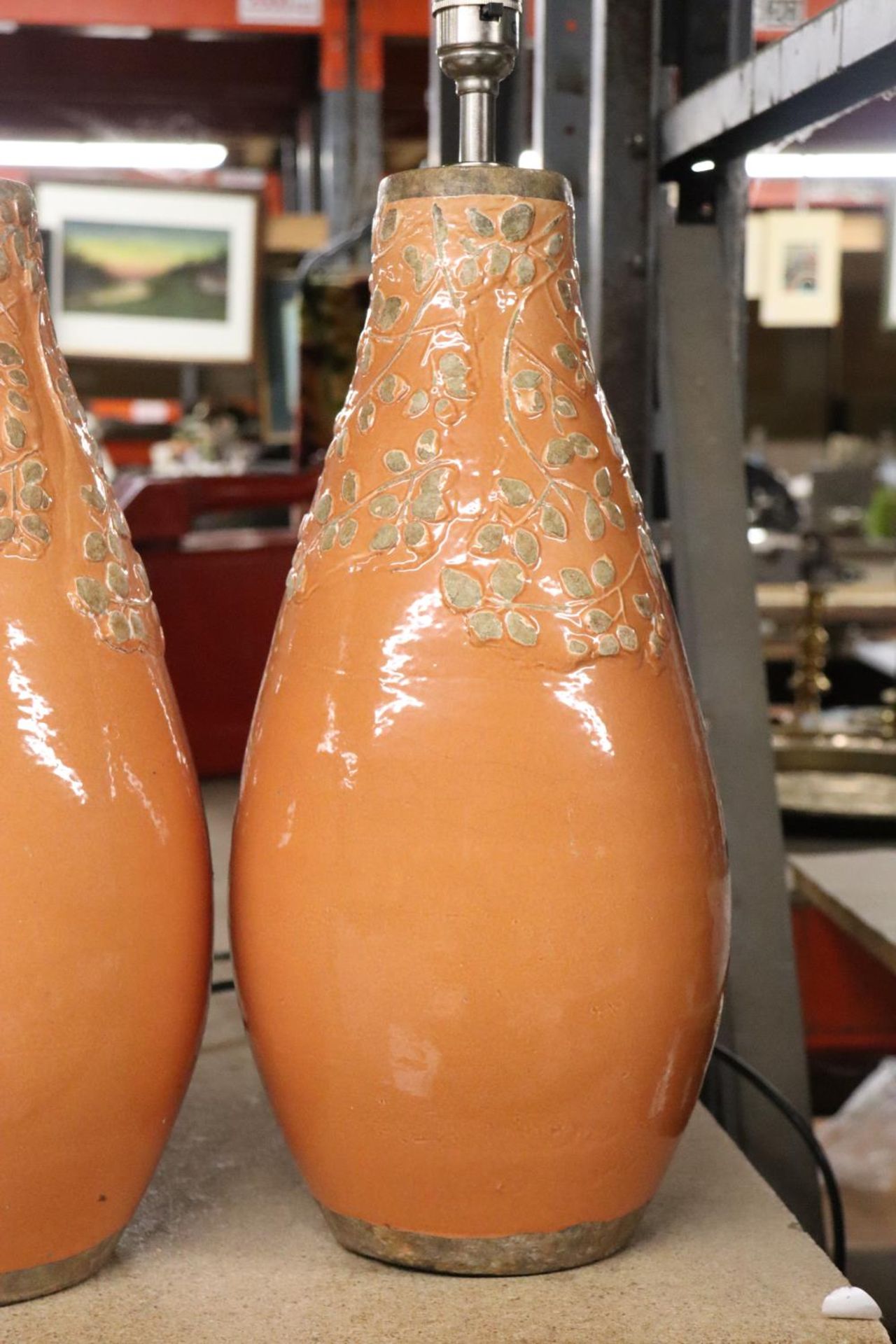 A LARGE PAIR OF STUDIO POTTERY LAMP BASES IN ORANGE WITH EMBOSSED LEAF DESIGN, HEIGHT APPROX 40CM - Image 3 of 4