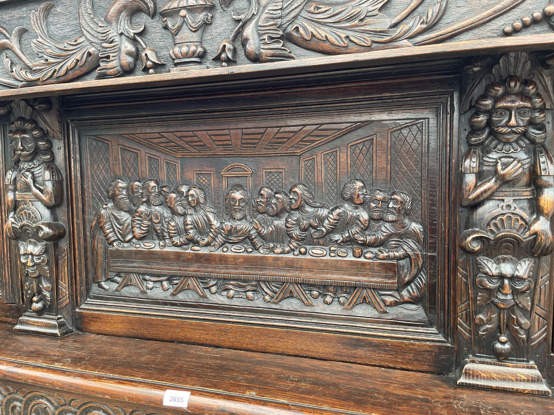AN OAK GEORGE III STYLE COURT CUPBOARD WITH CARVED PANELS, THREE DEPICTING THE BIRTH AND CRUCIFIXION - Image 7 of 12