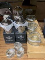 A QUANTITY OF AS NEW AND BOXED SCENTED CANDLES IN SILVER COLOURED CERAMIC HOLDERS, PLUS HEART AND
