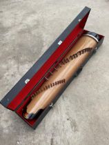 A KOTO MUSICAL INSTRUMENT WITH CARRY CASE