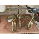 AN ASSORTMENT OF BRASS HORSE RIDING STIRRUPS