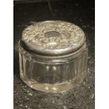 A HALLMARKED SILVER TOPPED GLASS POT