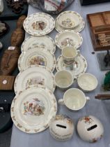 A LARGE COLLECTION OF ROYAL DOULTON 'BUNNYKINS' CERAMICS TO INCLUDE MONEY BOXES, PLATES, A CLOCK,
