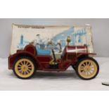 A VINTAGE BOXED, BATTERY OPERATED, TIN PLATE CAR