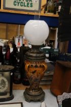 A DOULTON IVORY OIL LAMP WITH WHITE GLASS SHADE AND FUNNEL