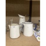 THREE GRADUCATED VINTAGE ENAMEL JUGS