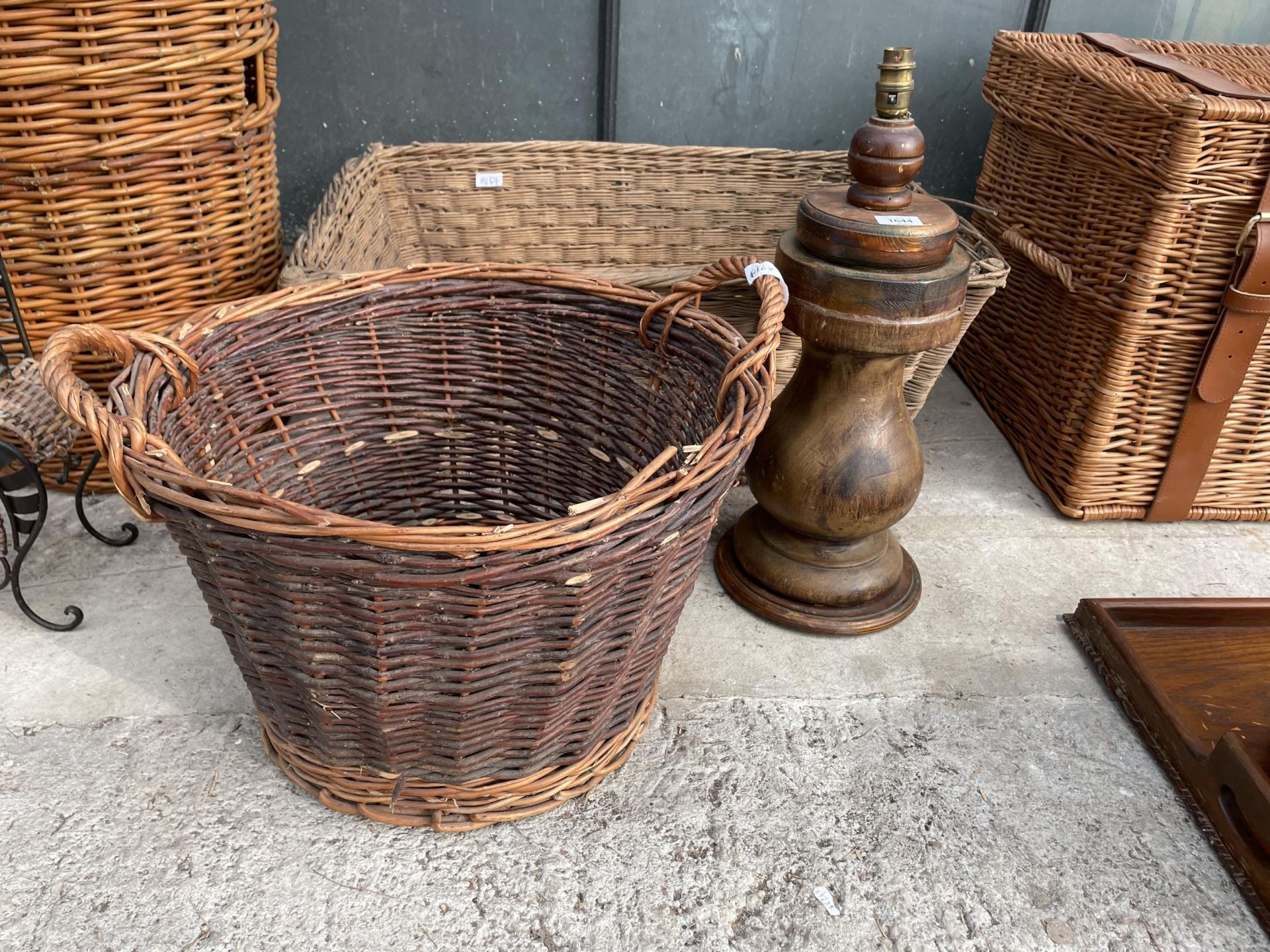 TWO LARGE WICKER LOG BASKETS AND A DECORATIVE WOODEN TABLE LAMP - Image 2 of 5