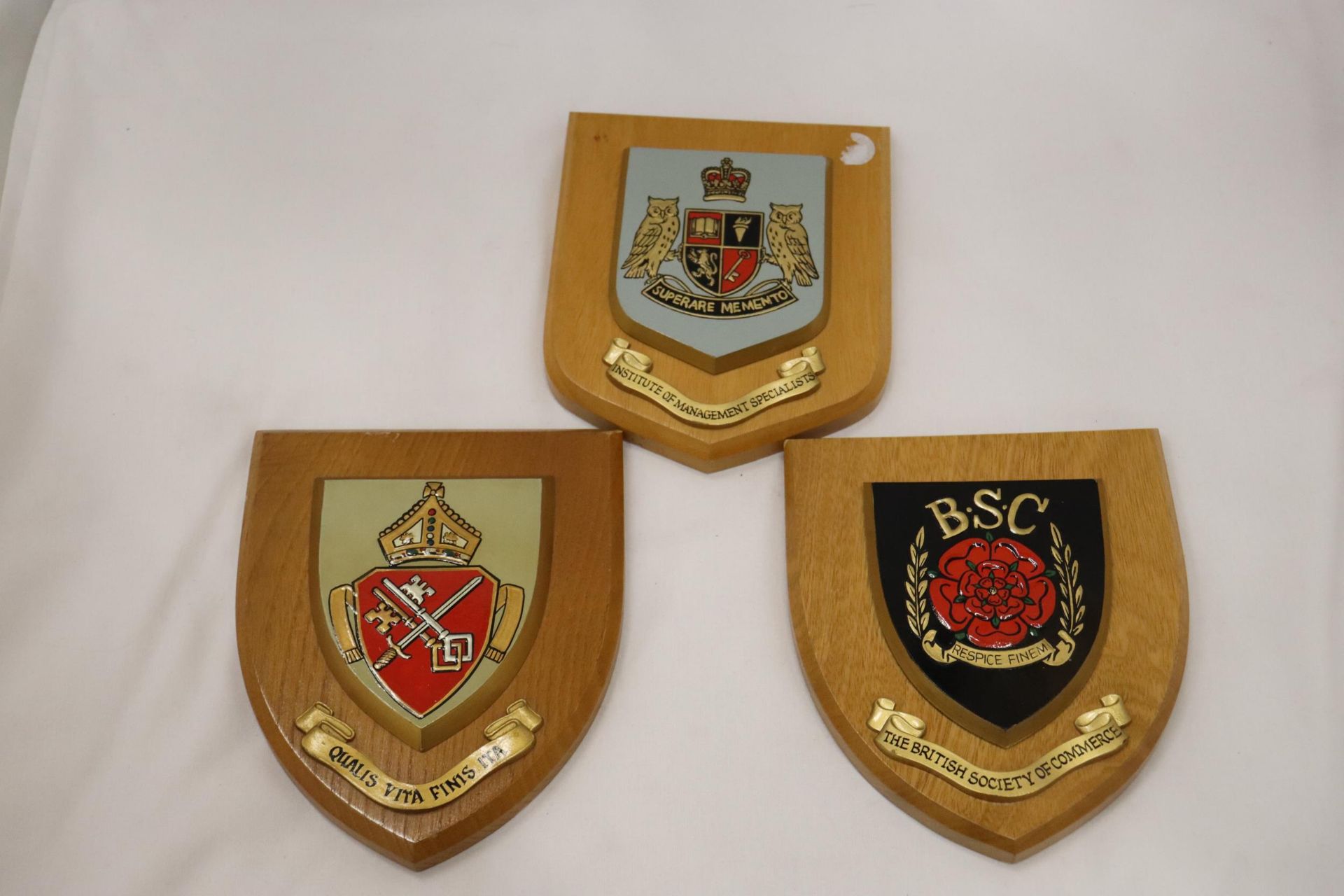 THREE BUSINESS/INDUSTRY WOODEN PLAQUES