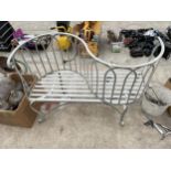 A DECORATIVE METAL BACK TO BACK TWO SEATER LOVE SEAT