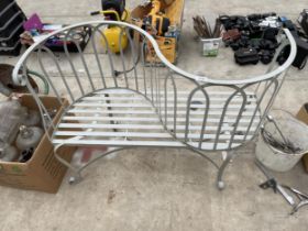 A DECORATIVE METAL BACK TO BACK TWO SEATER LOVE SEAT