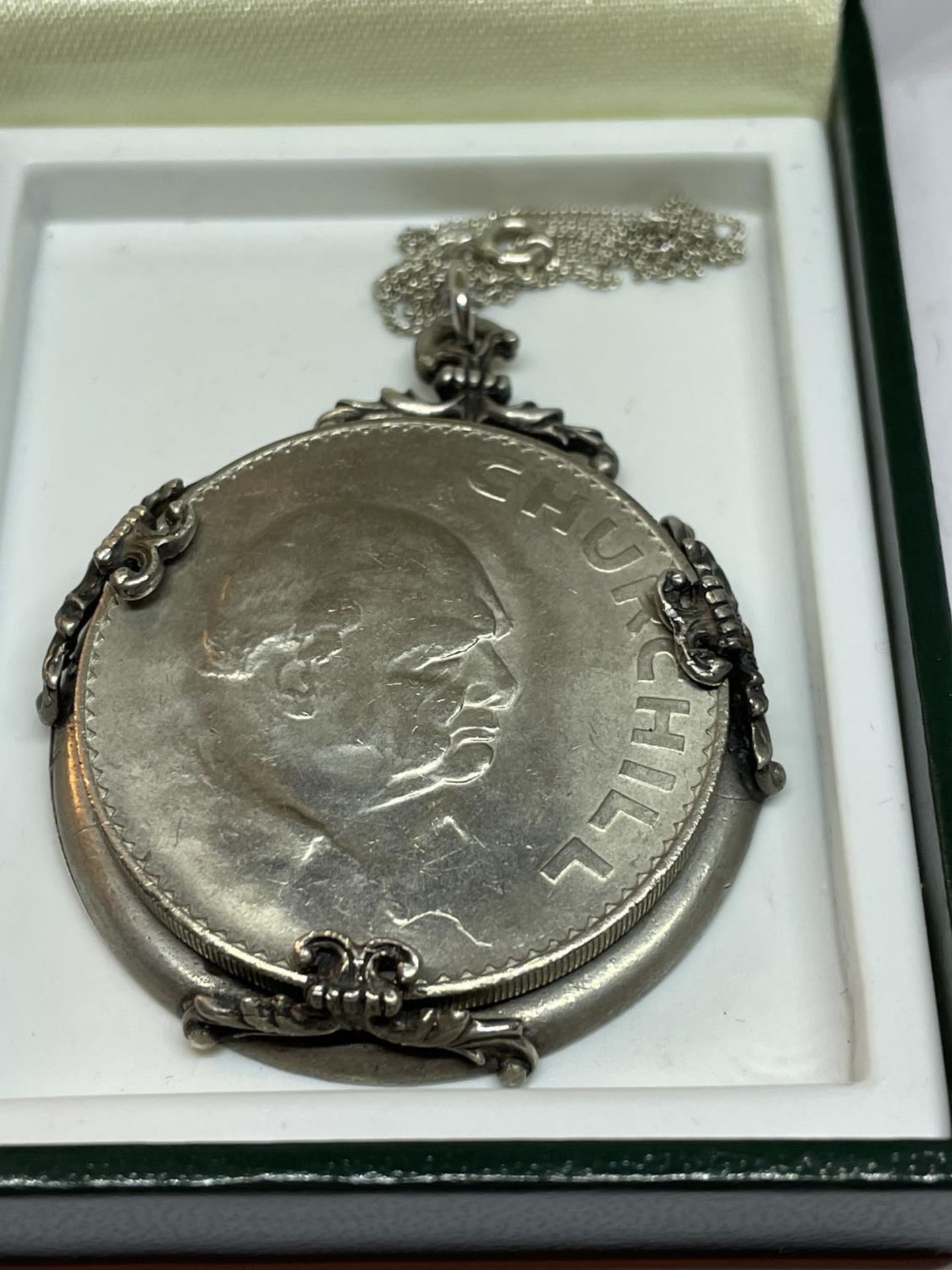 A CHURCHILL SILVER MOUNTED CROWN