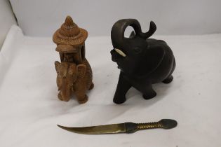 A HARDWOOD CARVED ELEPHANT, STONE ELEPHANT, MISSING A LEG AND A BRASS KNIFE