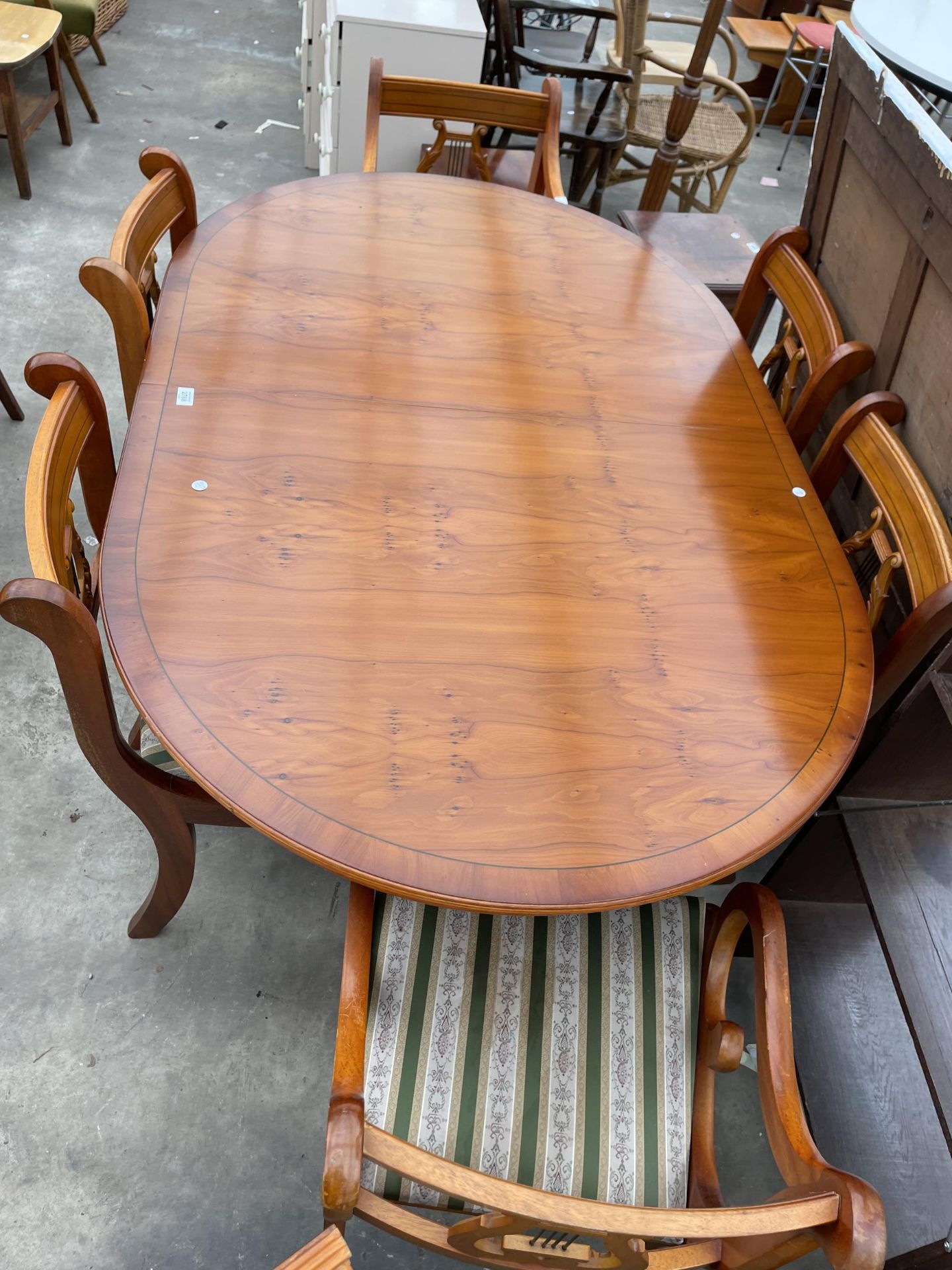 A YEW WOOD EXTENDING DINING TABLE 62" X 39" (LEAF 21.5") AND SIX LYRE BACK DINING CHAIRS ONE BEING A - Image 8 of 12