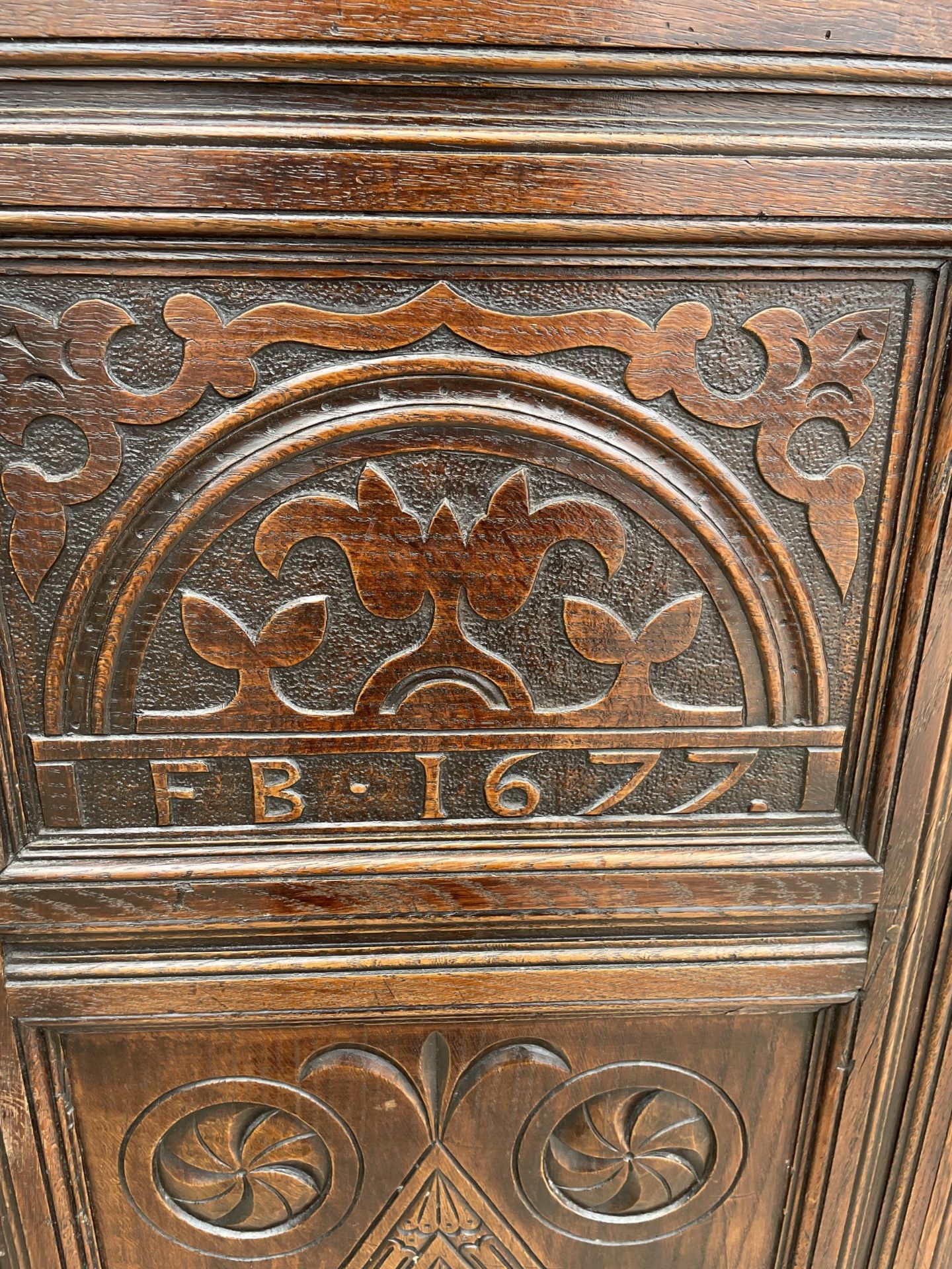 AN OAK GEORGE III STYLE COURT CUPBOARD WITH CARVED PANELS, THREE DEPICTING THE BIRTH AND CRUCIFIXION - Image 5 of 12