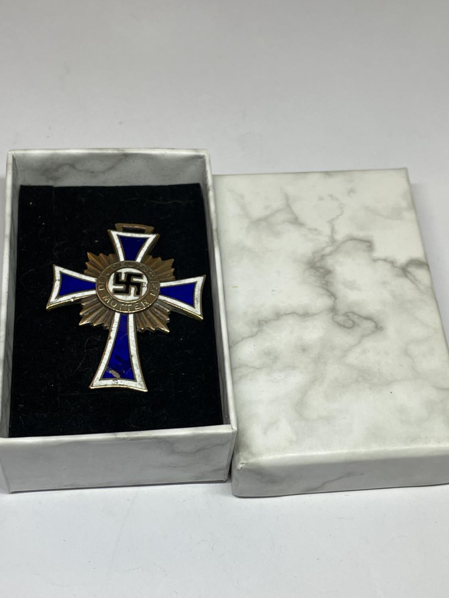 A GERMAN CROSS ENGRAVED IN A PRESENTATION BOX