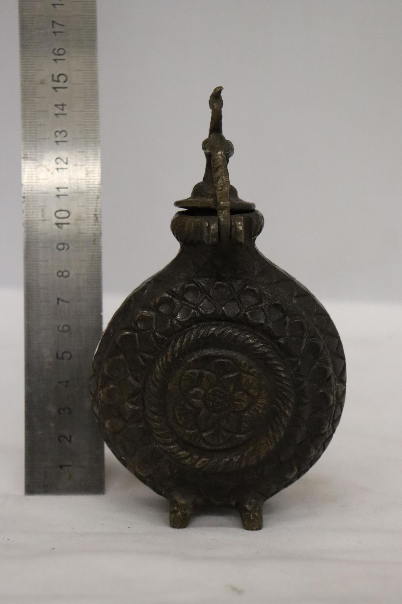 A DECORATIVE BRONZE INCENSE BURNER