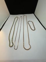THREE SILVER GILT NECKLACES AND A BRACELET