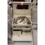 A JEWELLERY BOX CONTAINING A LARGE QUANTITY OF COSTUME JEWELLERY