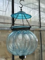 A BLUE GLASS HANGING CANDLE LANTERN MARKED 'VAL SYLAMBLRI BEST CRYSTAL GLASS MADE IN BELGIUM'