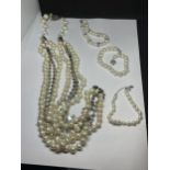 A ROSANTICA MILANO FRESH WATER PEARLS NECKLACE AND THREE BRACELETS