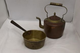 A HEAVY BRASS SAUCEPAN AND A COPPER AND BRASS KETTLE