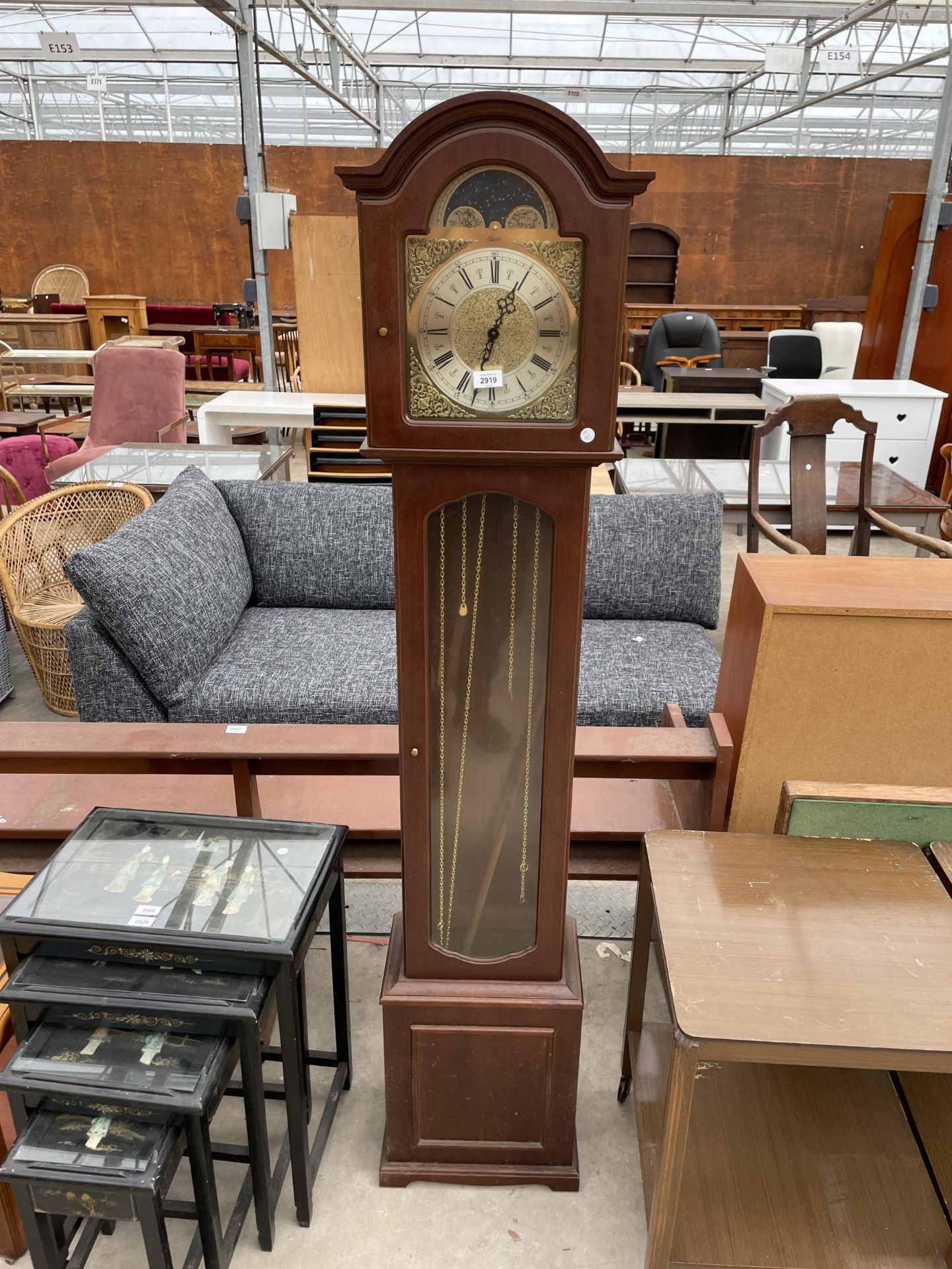 A MODERN HERMLE LONGCASE CLOCK WITH THREE WEIGHTS AND GLASS DOOR