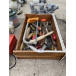 AN ASSORTMENT OF HAND TOOLS TO INCLUDE SCREW DRIVERS, SPANNERS AND SAWS ETC